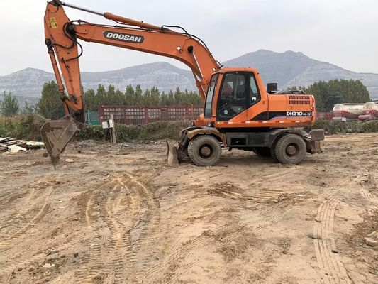 Αρχικό χρώμα Χρησιμοποιούμενος εξορυκτής τροχών Doosan DH210W-7 σε καλή κατάσταση/Χρησιμοποιούμενος εξορυκτής τροχών Doosan προς πώληση