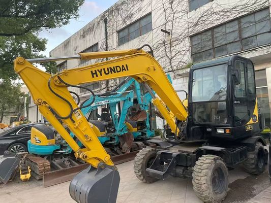 Χρησιμοποιούμενος R60W-7 Μίνι Hyundai τροχοφόρος εξορυκτής Σταθερός και υψηλή απόδοση