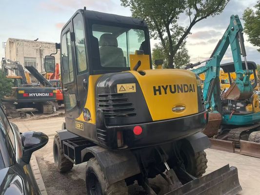 Χρησιμοποιούμενος R60W-7 Μίνι Hyundai τροχοφόρος εξορυκτής Σταθερός και υψηλή απόδοση